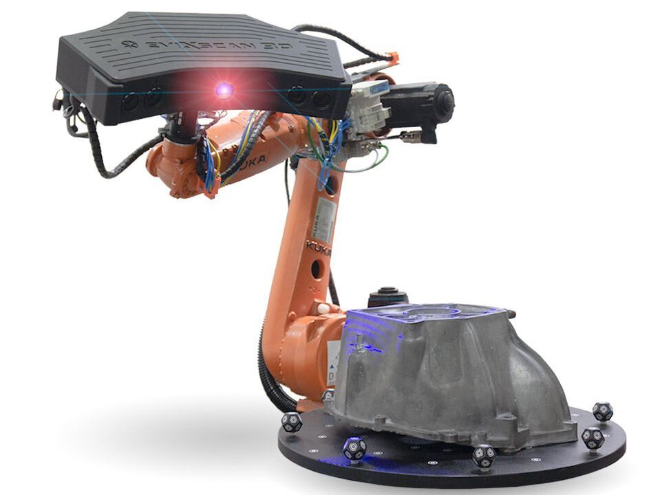 eviXscan 3D scanner on robotic arm with turntable and 3D markers